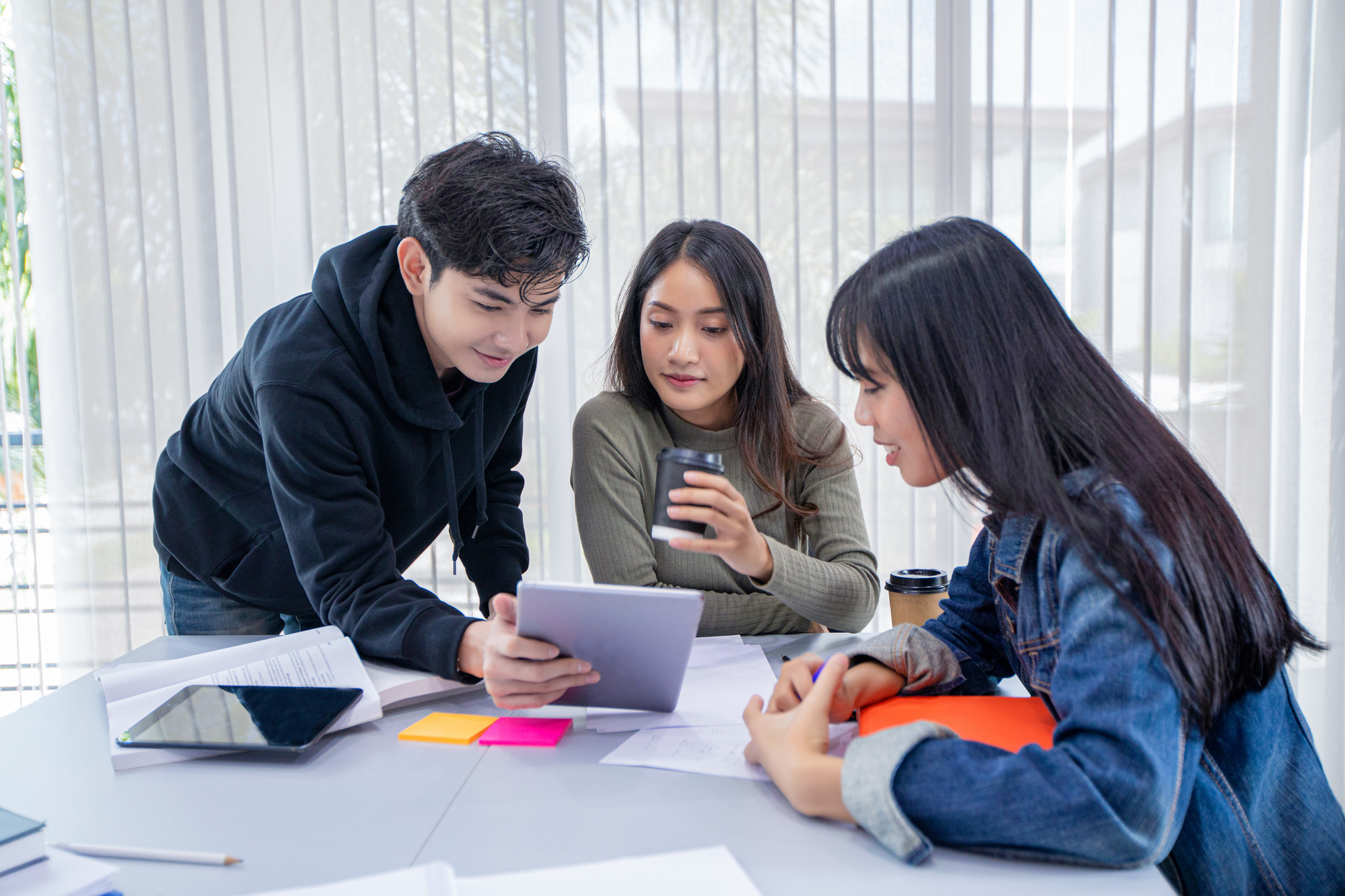 Group of Asian College Students Studying Together